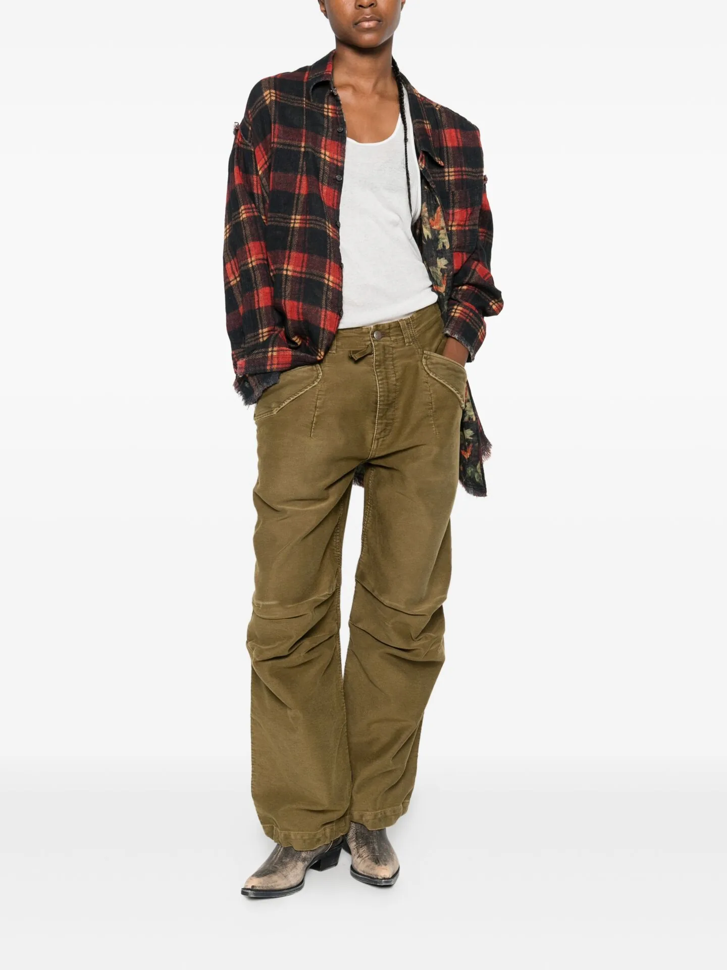 Red plaid shirt worn open over a white tank and olive cargo trousers