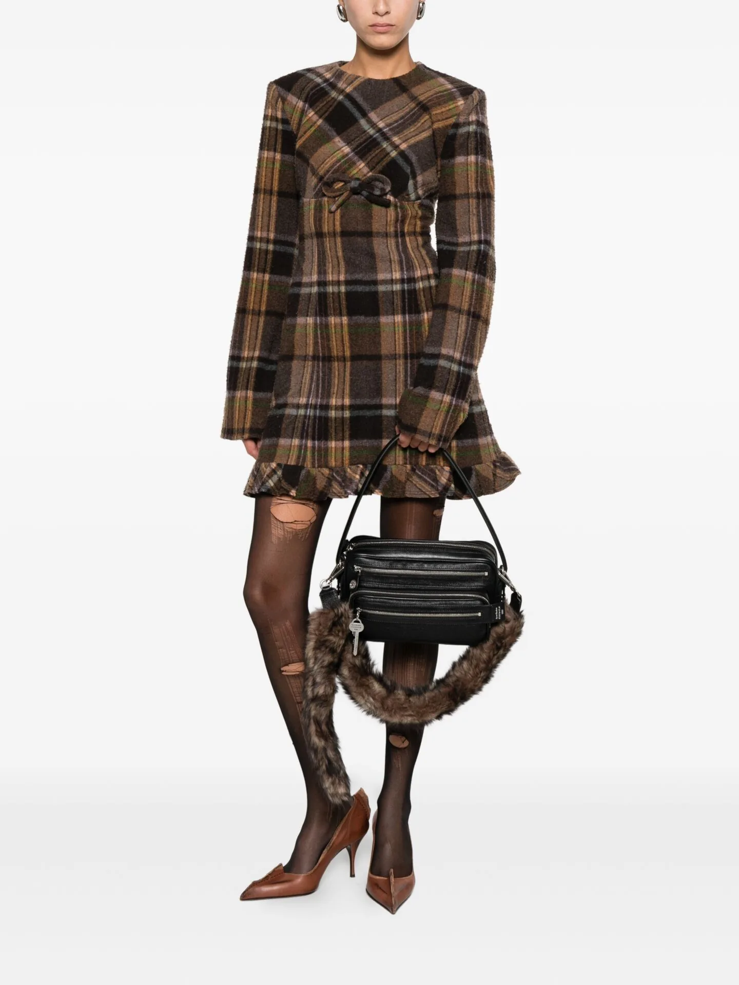 Brown plaid mini dress with a ruffled hem, patterned tights and brown heels